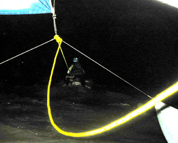 Chris tows the Cabana to shore